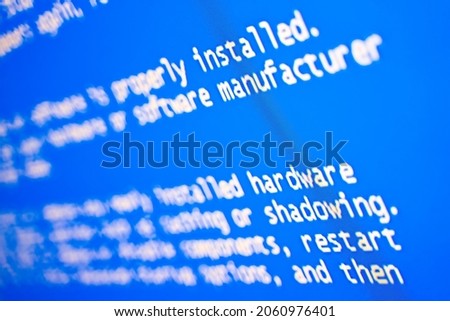 Blue screen of death on computer. Selective focus