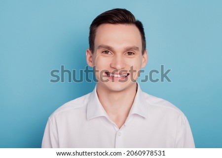 Photo of young handsome man chappy positive smile toothy stomatology cavity protection isolated over blue color background Royalty-Free Stock Photo #2060978531