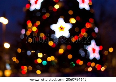 Christmas tree during a holiday in the city - bokeh