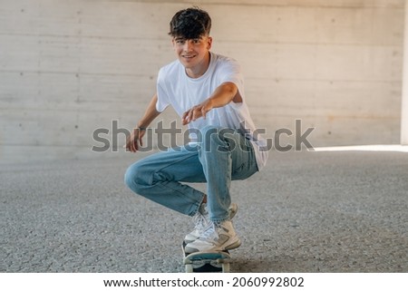 teenager skateboarding on the street