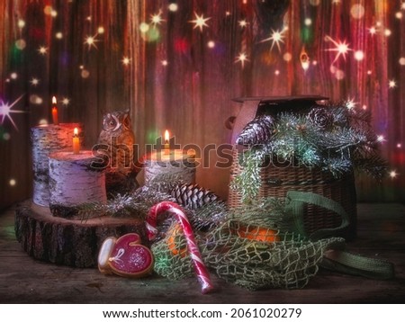 Christmas still life with candles and decorations