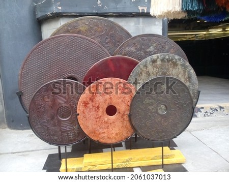 Bi Jade disks in Pan Jia Yuan antique market, Beijing, China
