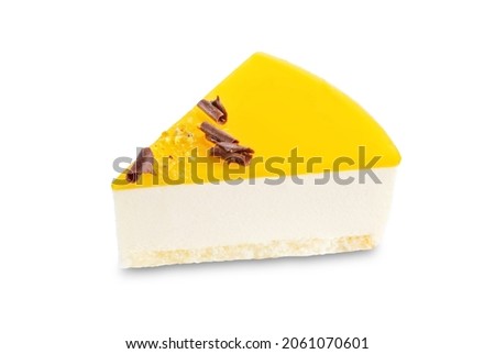 Mango mousse cake on a white isolated background. toning. selective focus