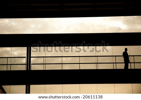 worker inside the modern building in silhouette