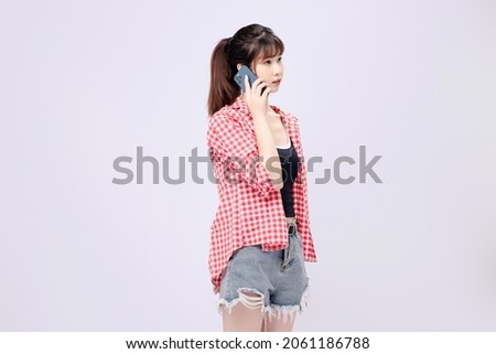 Beautiful Asian woman in red shirt