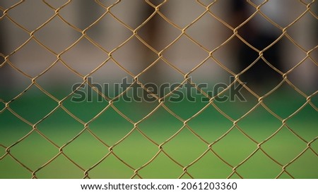 Close up of old chain fence at a football ground. Selective Focus