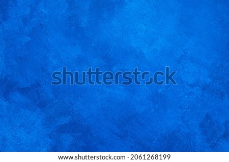 Dark blue concrete wall texture background. Copy space