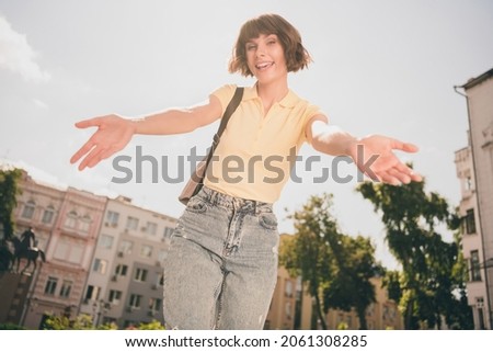 Low angle view portrait of attractive kind friendly cheerful girl hugging you traveling on fresh air outdoors
