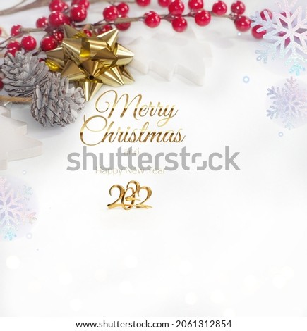 Festive background with merry Christmas and happy new year 2022 greeting card with christmas decoration and bokeh lights 