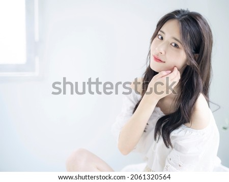Fashion concept of young asian woman. Beauty photo. Cosmetics. Skin care. Body care. Royalty-Free Stock Photo #2061320564