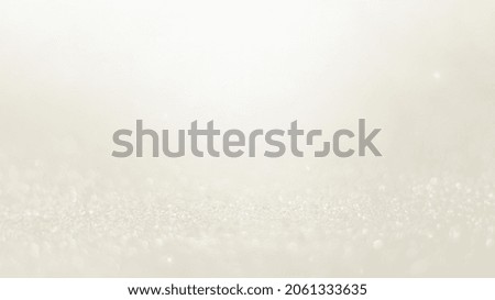 Abstract white bokeh glitter background. Blur background. Abstract background Royalty-Free Stock Photo #2061333635