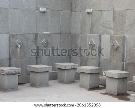 modern mosque ablution place, for Muslims to perform ablution before praying in the mosque. Also used for washing hands Royalty-Free Stock Photo #2061352058
