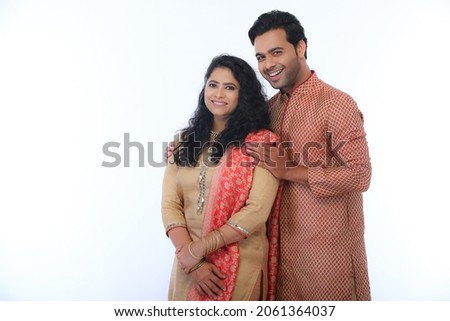 Young couple celebrating diwali with full of happiness