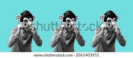 three men wearing monkey masks taking a picture with retrocameras in black and white on a blue background, in a panoramic format to use as web banner or header

