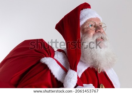 Santa Claus on gray background with copy space. Banner art.