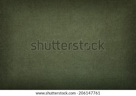 Olive green cotton texture with vignette