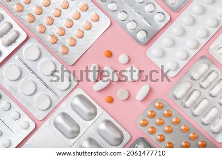 Treatment concept. Background fill of many blisters of medical pills, tablets. Top view of pharmacy drug. Healthcare concept. pharmaceutical background from medicaments. Vitamin Royalty-Free Stock Photo #2061477710