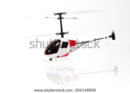 Little RC helicopter on white background