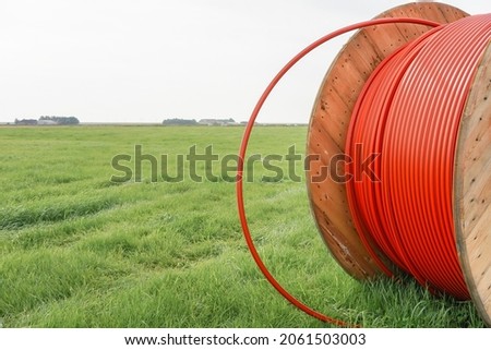 Broadband cable to develop rural areas  Royalty-Free Stock Photo #2061503003