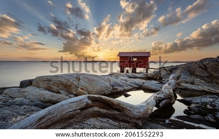 Colorful sunset at the coast of Sweden Royalty-Free Stock Photo #2061552293