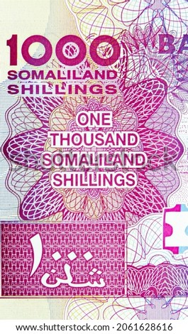 1000 Somaliland Shillings banknote, Bank of Somaliland, closeup bill fragment shows Face value in text and numeral, issued 2014