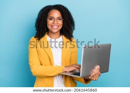 Photo of young black business woman happy positive smile chat email laptop programmer isolated over blue color background