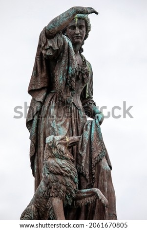 The statue of Flora MacDonald at Inverness Castle in Scotland - she helped Charles Edward Stuart evade government troops after the Battle of Culloden in 1746,. Royalty-Free Stock Photo #2061670805