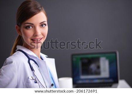 Female doctor working isolated on white background