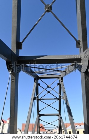 wooden gray painted bridge structure against the sky background