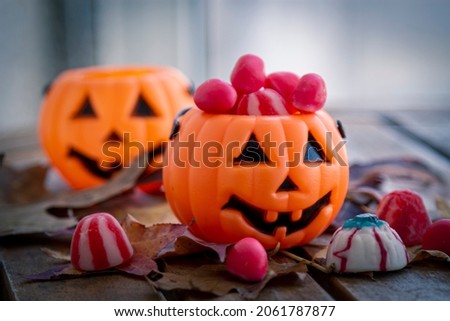 happy halloween. pumpkin with sweets and candies