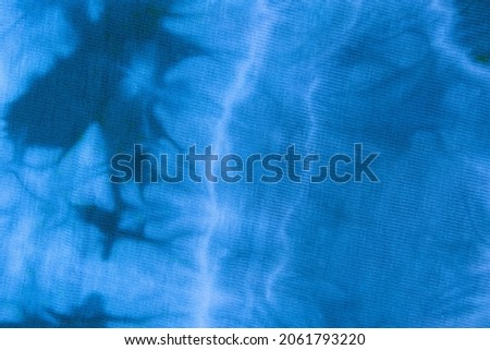Blue tie dye fabric hand made pattern.