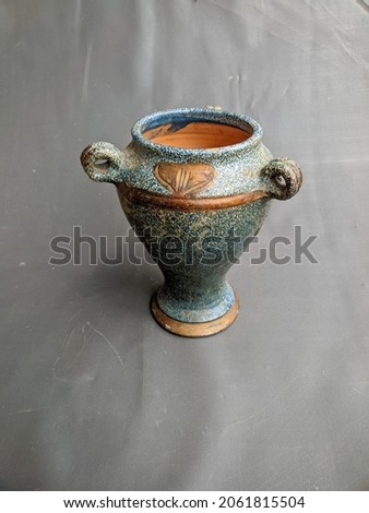 an antique ceramic jar made of beautiful clay
