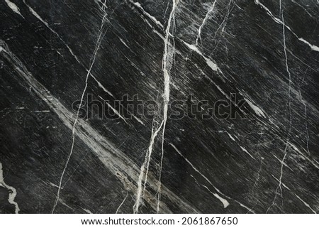 Black and white marble stone wall or floor texture background 