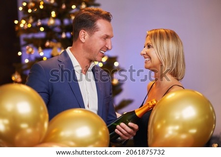 Young nice friends celebrating new year party