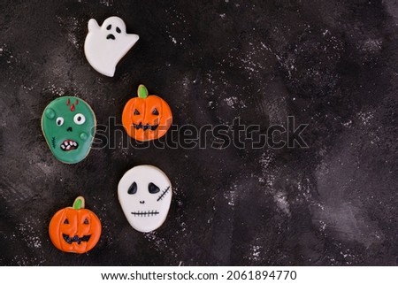 halloween cookies on dark background