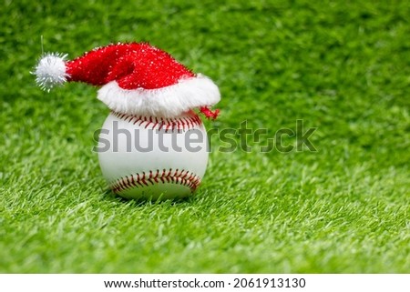 Baseball Christmas with Christmas Decoration on green grass