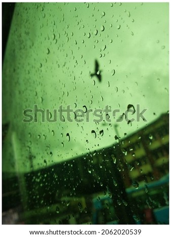 Water droplets in windowsill view
