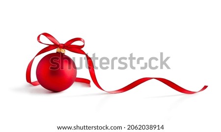 Red bauble, christmas ball with a ribbon decoration, isolated on white background. Clipping path included.