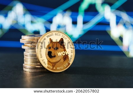 Dogecoin cryptocurrencies and graph statistic background Royalty-Free Stock Photo #2062057802