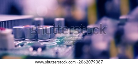 Semiconductor. cpu chip located on the green motherboard of the computer. Semi conductor motherboard circuit board. Hightech computer board with manufacture chip pcb technology. Smart phone iot chip. Royalty-Free Stock Photo #2062079387
