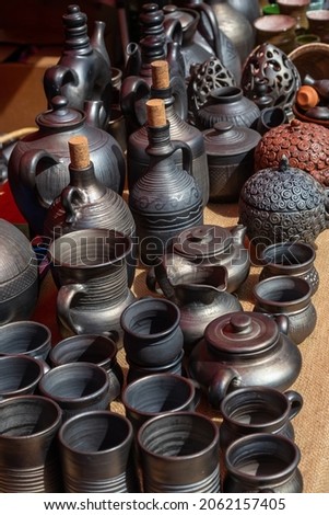 Traditional homemade ceramic pots on traditional crafts fair.