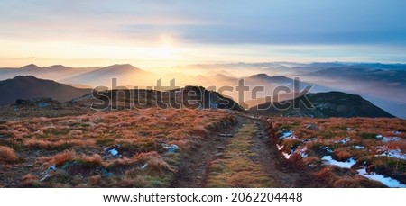 Beautiful landscape from Mount PipIvan in the morning light. Hiking. Dawn sunrise in autumn is beautiful in the mountains. Location place Carpathian mountains, Ukraine, Europe. Vibrant photo wallpaper