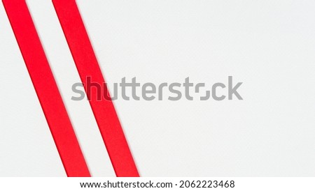 Abstract background with red and white paper sheets, excellent for use as a design element or as inspiration for website cover ideas.