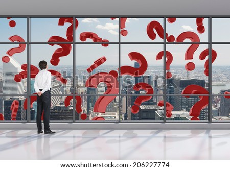 Red falling question marks outside the office room and a confused businessman.