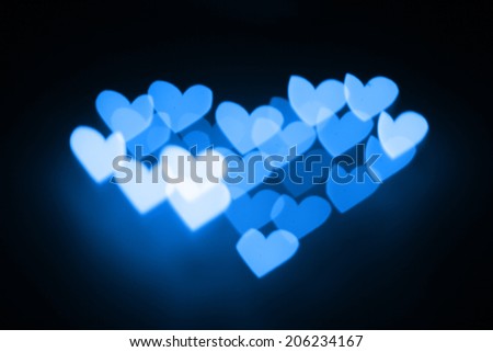 Filtered heart bokeh blurred background.