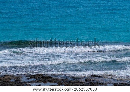 Turquoise water of Atlantic ocean. Corralejo beach, Fuerteventura, Spain.
