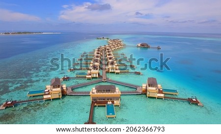 Maldives hotel with in-room private pool perched on stilts