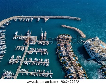 Aerial shot from drone of marina port with yachts and sailboats