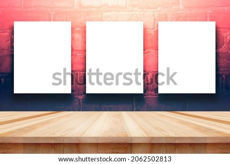 Poster or frame mock up template with office items and painting brushes on wooden table