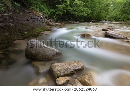 Beautiful River in the mountains. Environment concept. Water landscape peaceful and calm nature background.	